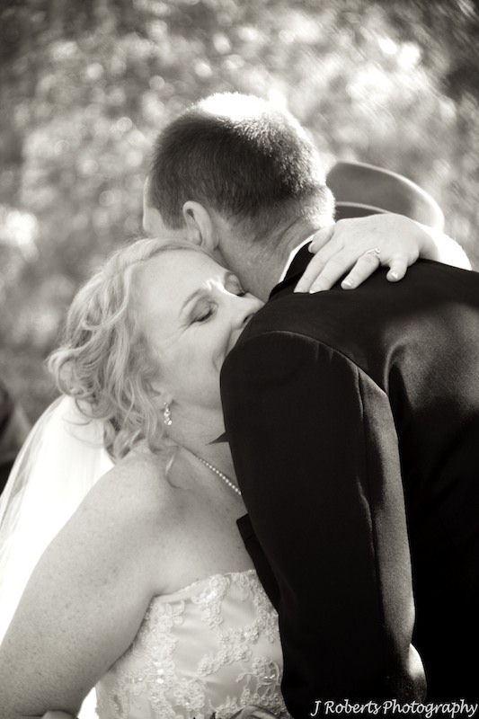 Bride and groom hugging - wedding photography sydney